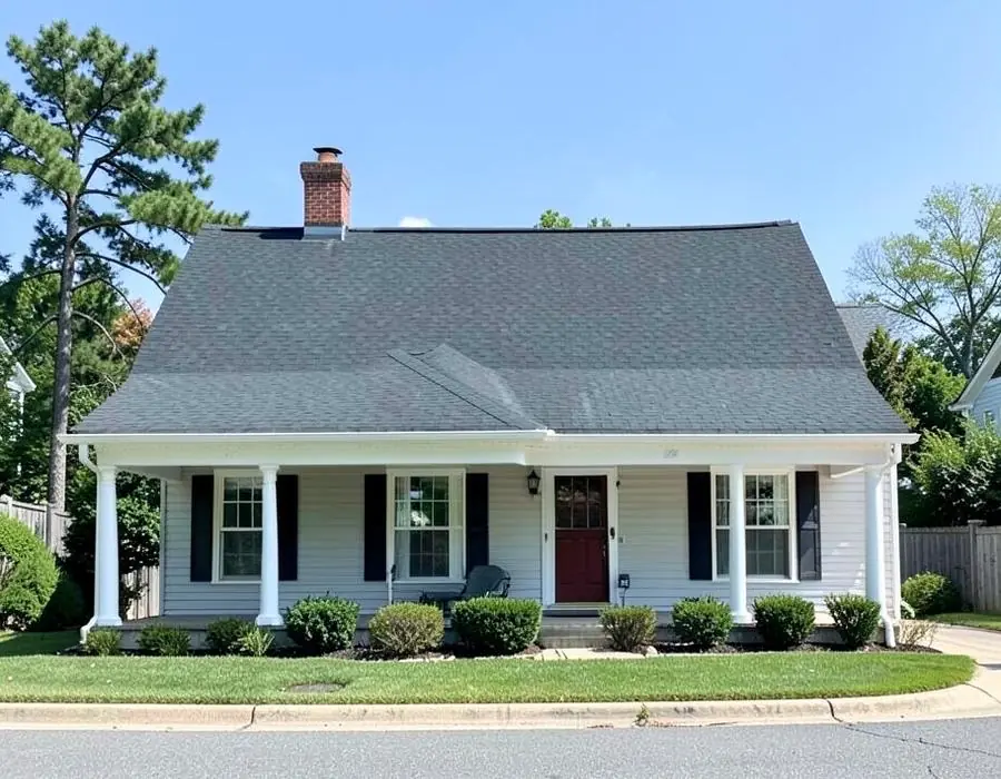 Completed dark shingle roof on a Buffalo home